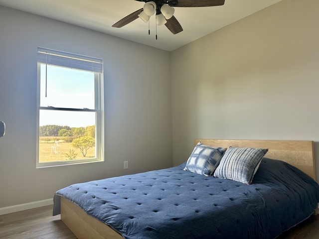 1323 Sioux Turn Kankakee, IL 60901 - Photo 11 of 15 a bed sitting in a bedroom next to a window