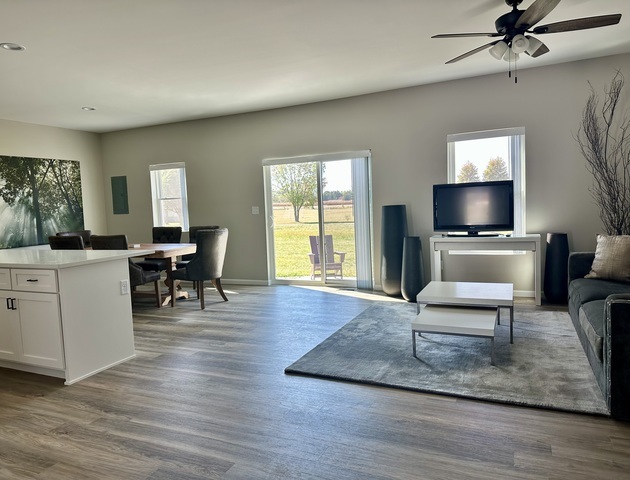 1323 Sioux Turn Kankakee, IL 60901 - Photo 3 of 15 a view of a livingroom with furniture and a flat screen tv