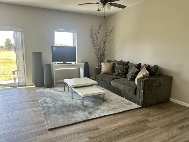 1323 Sioux Turn Kankakee, IL 60901 - Photo 4 of 15 a living room with furniture and a wooden floor