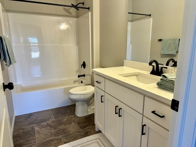 1323 Sioux Turn Kankakee, IL 60901 - Photo 9 of 15 a bathroom with a sink toilet and shower