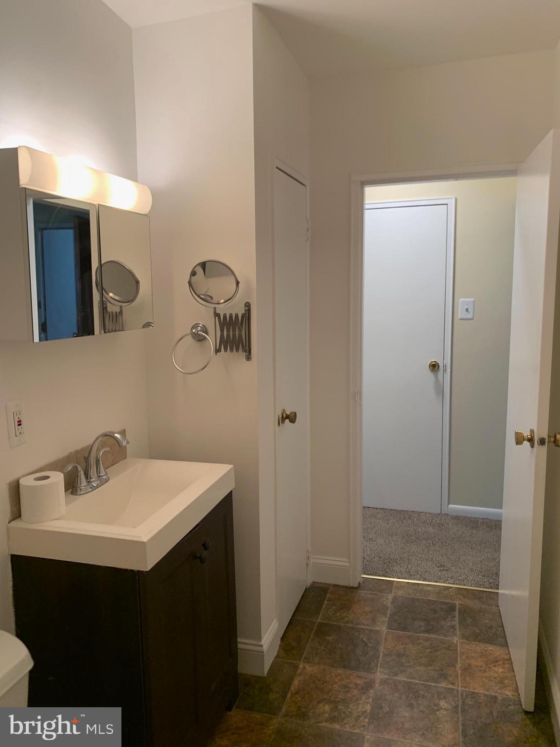 459 Hockersville Road, Unit 305 Hershey, PA 17033 - Photo 10 of 14 a bathroom with a sink and a mirror
