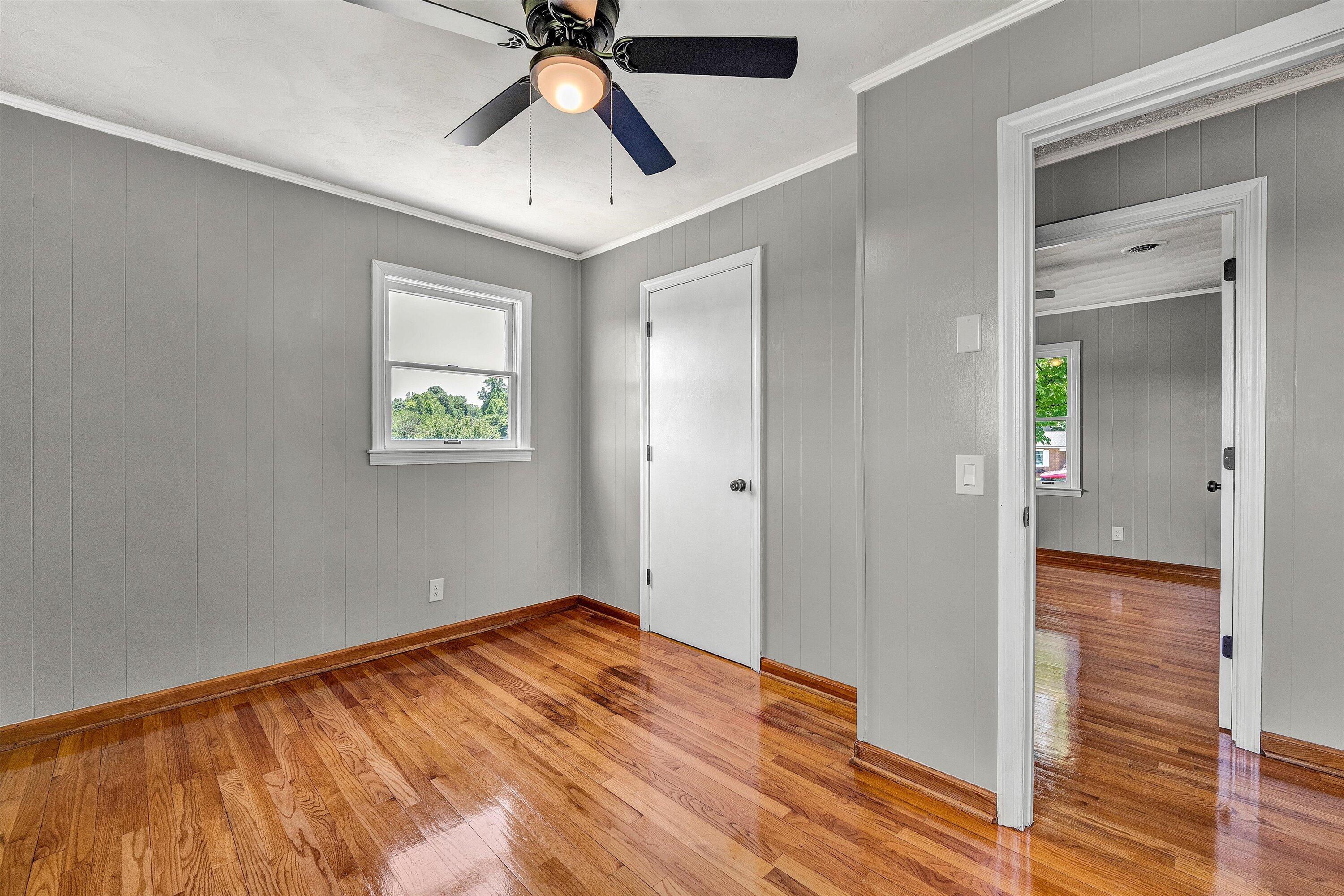 602 Power Dam Road Rocky Mount, VA 24151 - Photo 14 of 34 wooden floor in an empty room with a window
