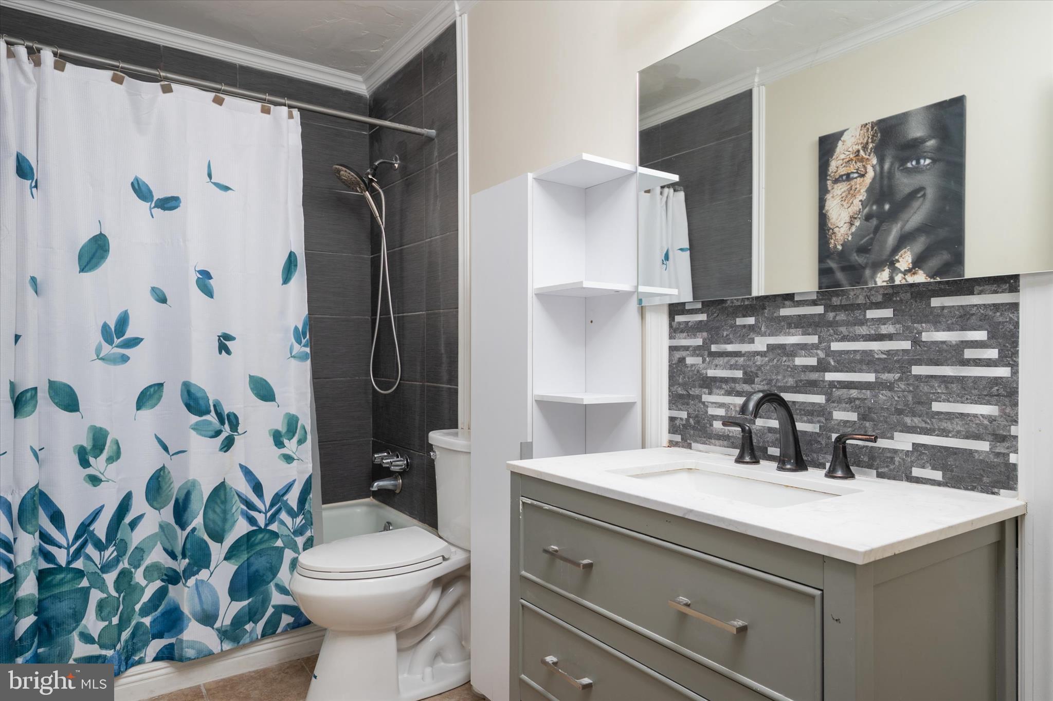 155 Barbara Road Severna Park, MD 21146 - Photo 15 of 51 a bathroom with a sink toilet and shower