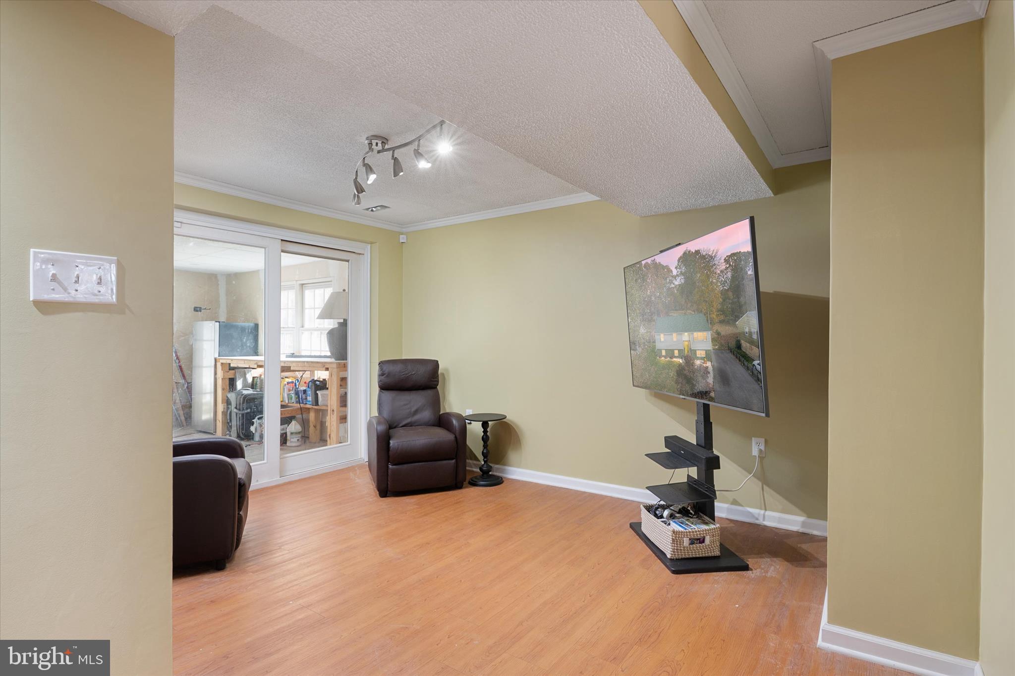155 Barbara Road Severna Park, MD 21146 - Photo 22 of 51 a view of a livingroom with furniture and a flat screen tv