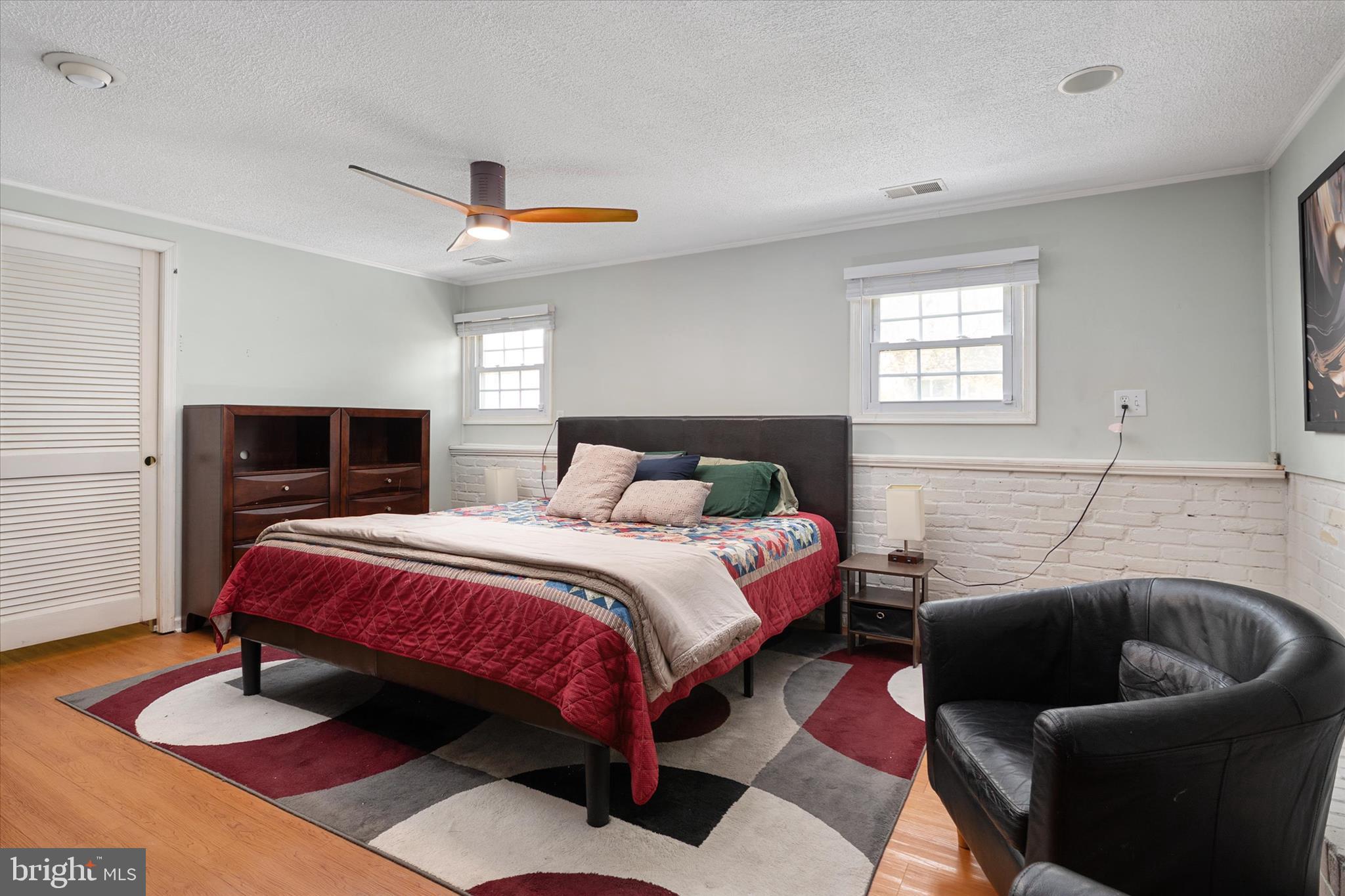 155 Barbara Road Severna Park, MD 21146 - Photo 26 of 51 a bedroom with bed and a couch