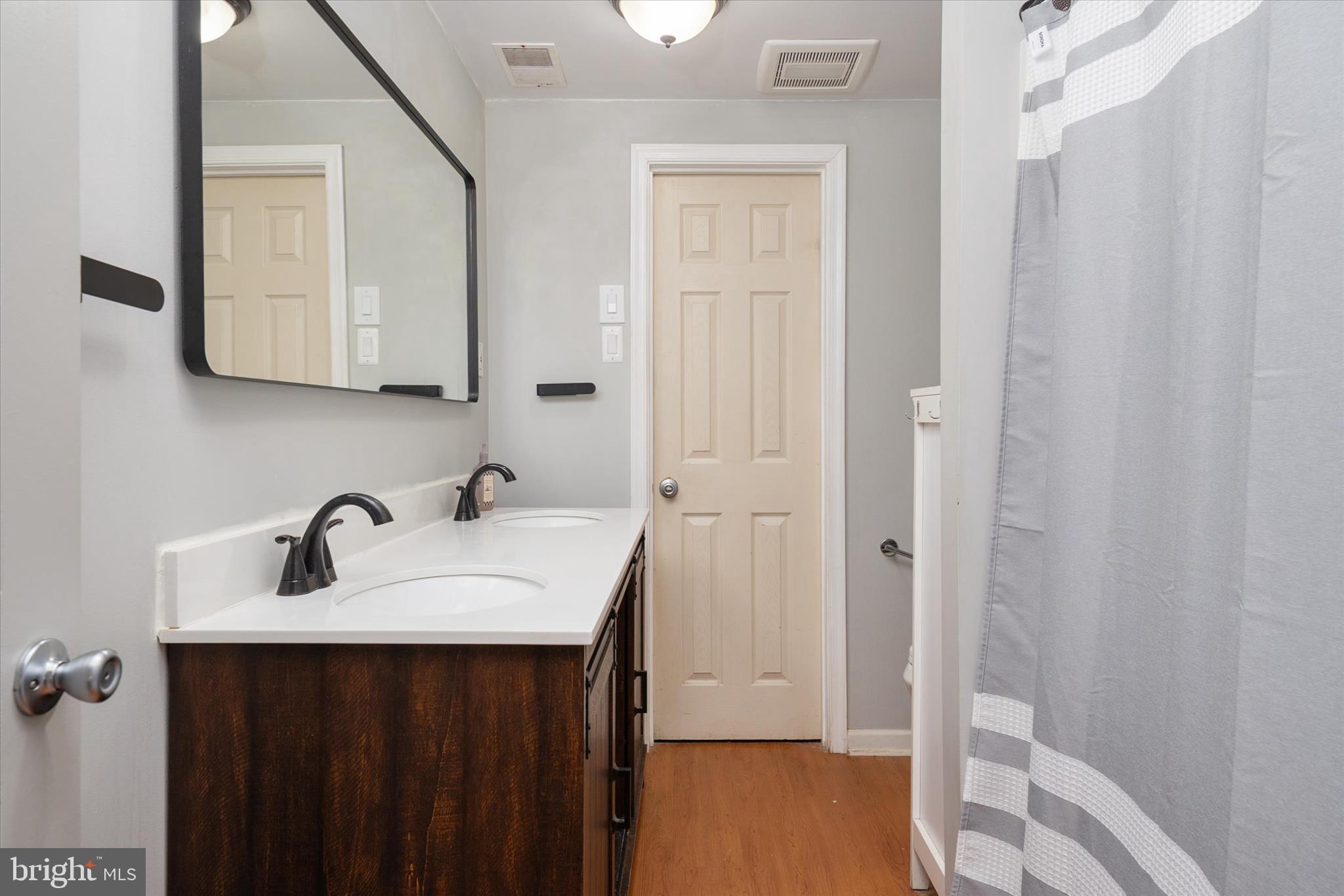 155 Barbara Road Severna Park, MD 21146 - Photo 28 of 51 a bathroom with a sink and a mirror