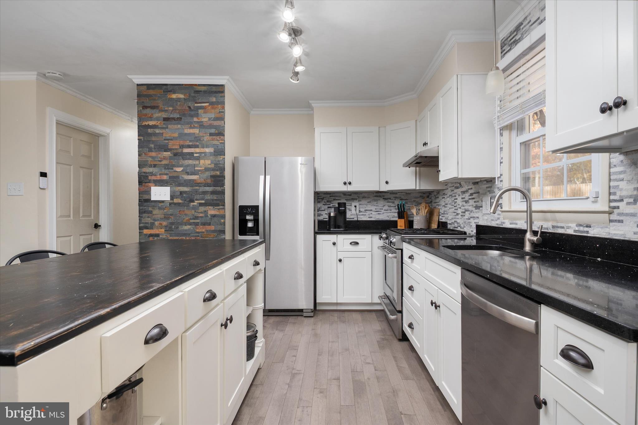 155 Barbara Road Severna Park, MD 21146 - Photo 7 of 51 a kitchen with stainless steel appliances granite countertop a sink stove and refrigerator