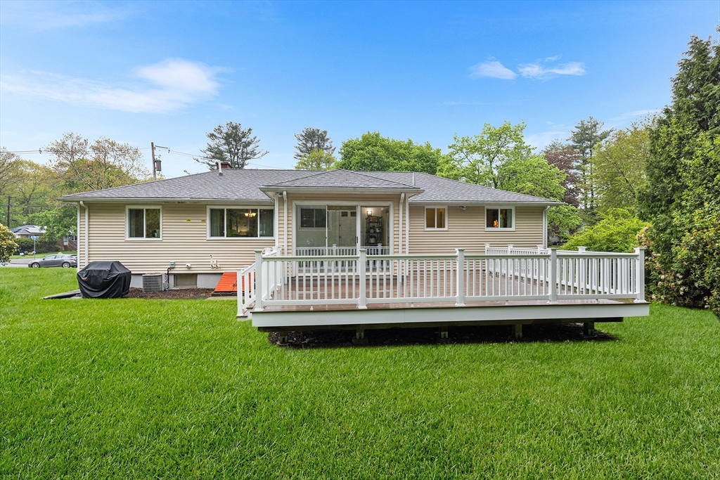 31 Livoli Road Framingham, MA 01701 - Photo 30 of 32 a view of a house with a backyard and deck