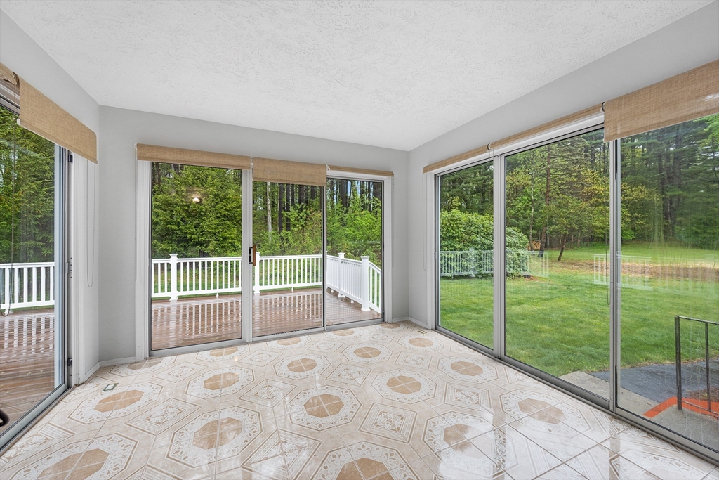 31 Livoli Road Framingham, MA 01701 - Photo 10 of 32 a view of a bedroom with balcony and balcony