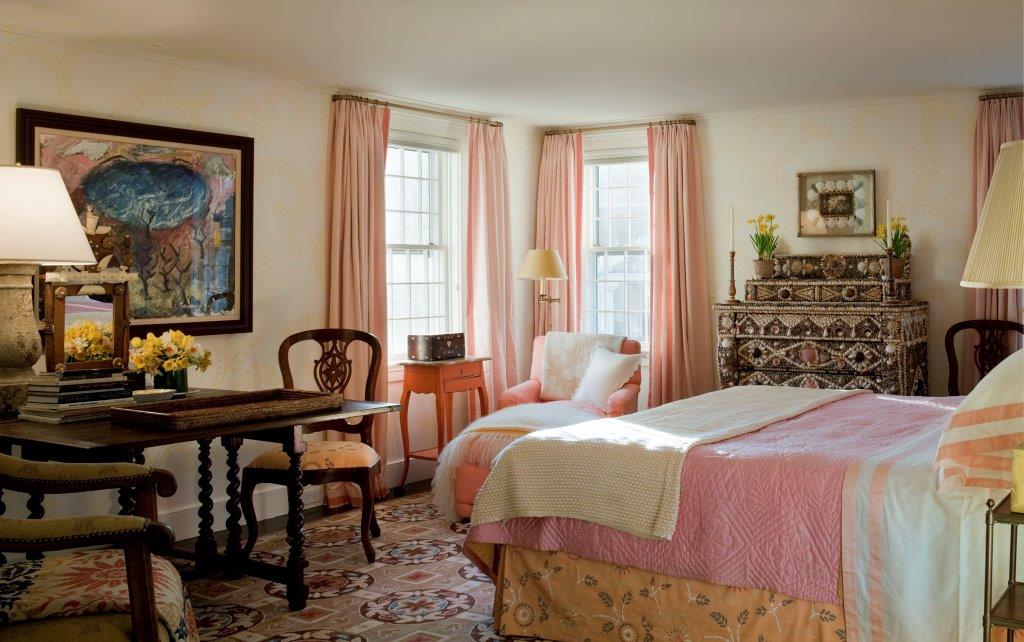 1 Twin Street Nantucket, MA 02554 - Photo 20 of 32 a bedroom with a bed and a table with chair