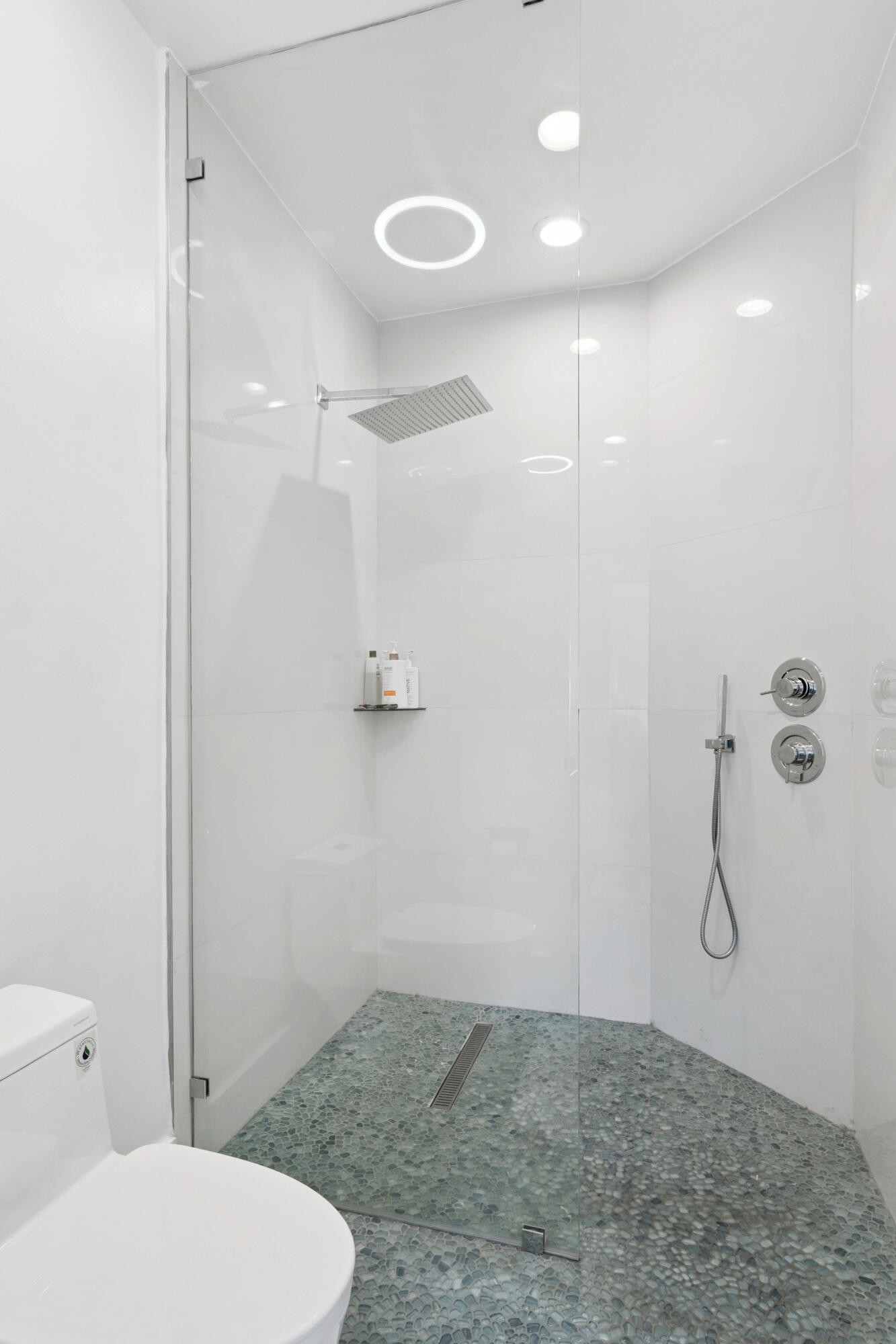 7110 Northwest Turtle Walk Boca Raton, FL 33487 - Photo 13 of 36 a bathroom with a toilet and a shower