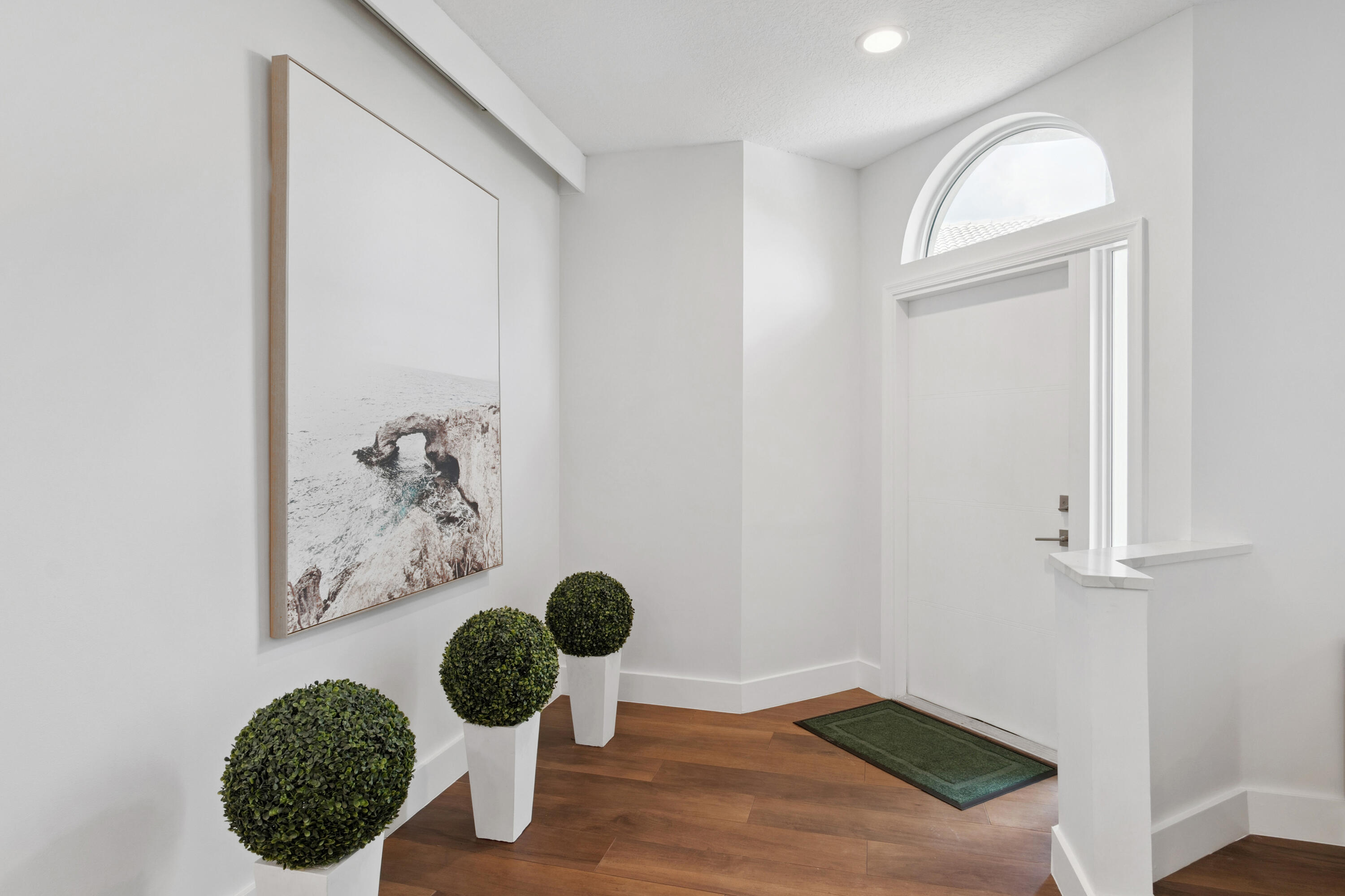 7110 Northwest Turtle Walk Boca Raton, FL 33487 - Photo 4 of 36 a bathroom with a sink and a mirror
