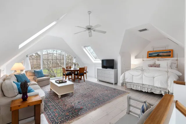 a bathroom with a tub and shower