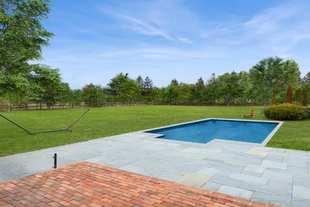 a view of a house with a swimming pool