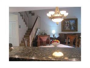 6115 Via Laguna Lane Boca Raton, FL 33433 - Photo 7 of 14 a view of entryway and hall with a chandelier