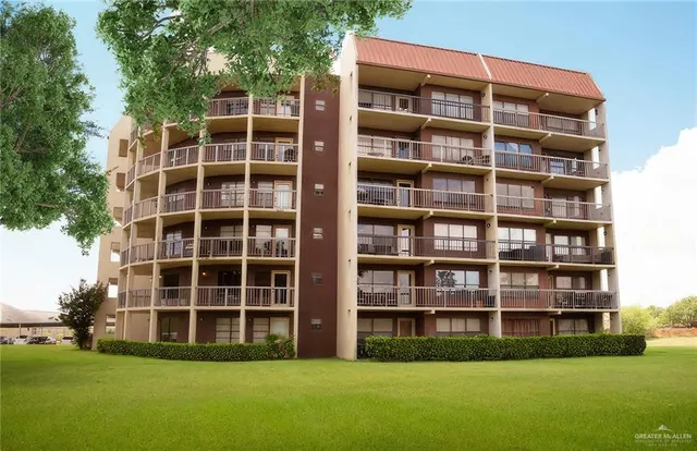 a view of building with yard