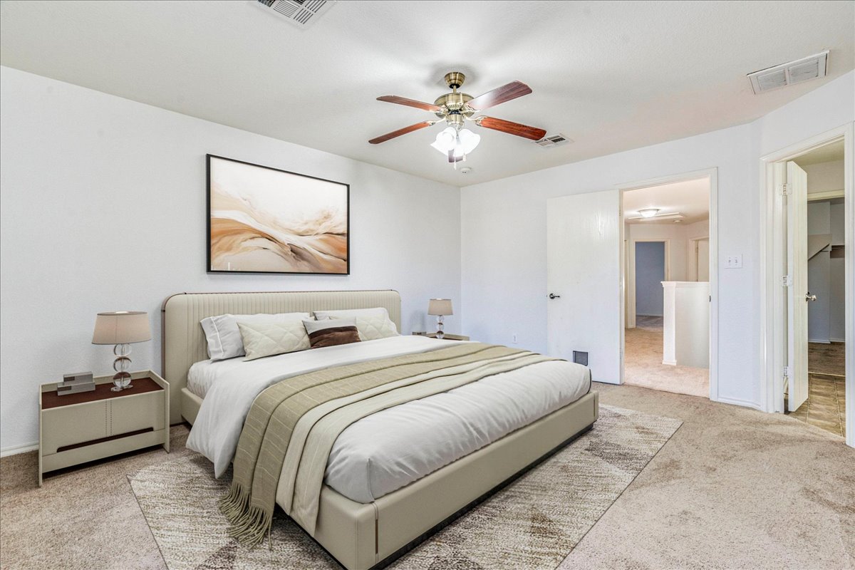 8700 Wiley Way Austin, TX 78747 - Photo 13 of 26 Large primary bedroom.