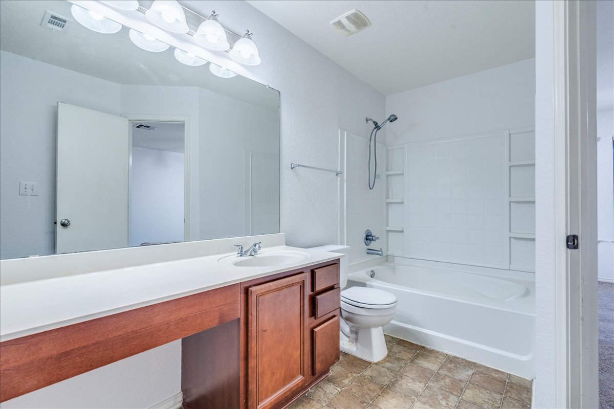 8700 Wiley Way Austin, TX 78747 - Photo 15 of 26 Primary bathroom.