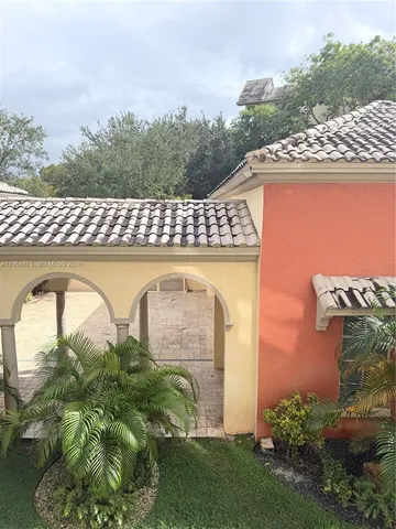 a view of a lake with a building in the background