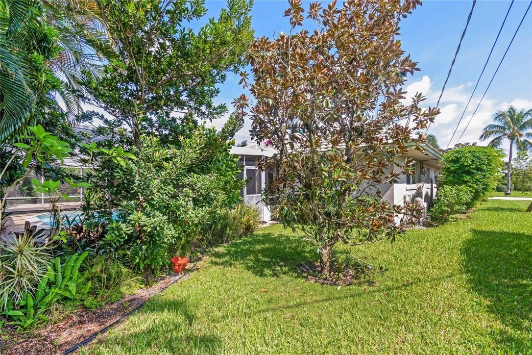612 Canistel Lane Boca Raton, FL 33486 - Photo 18 of 19 Back Lawn