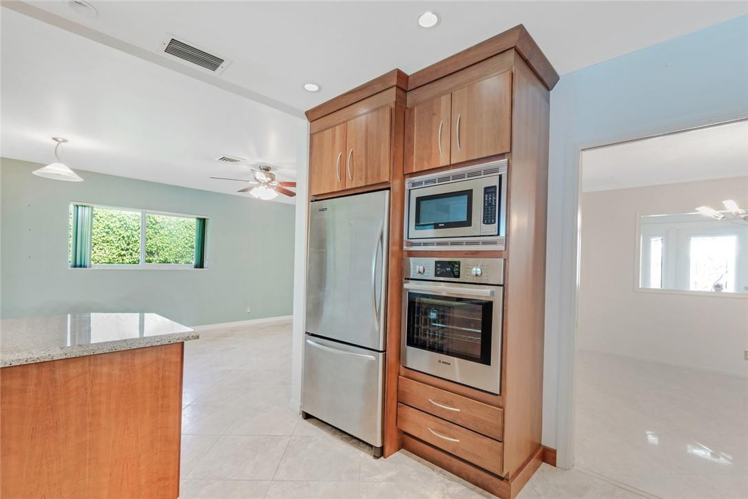 612 Canistel Lane Boca Raton, FL 33486 - Photo 9 of 19 Kitchen leading to Family Room