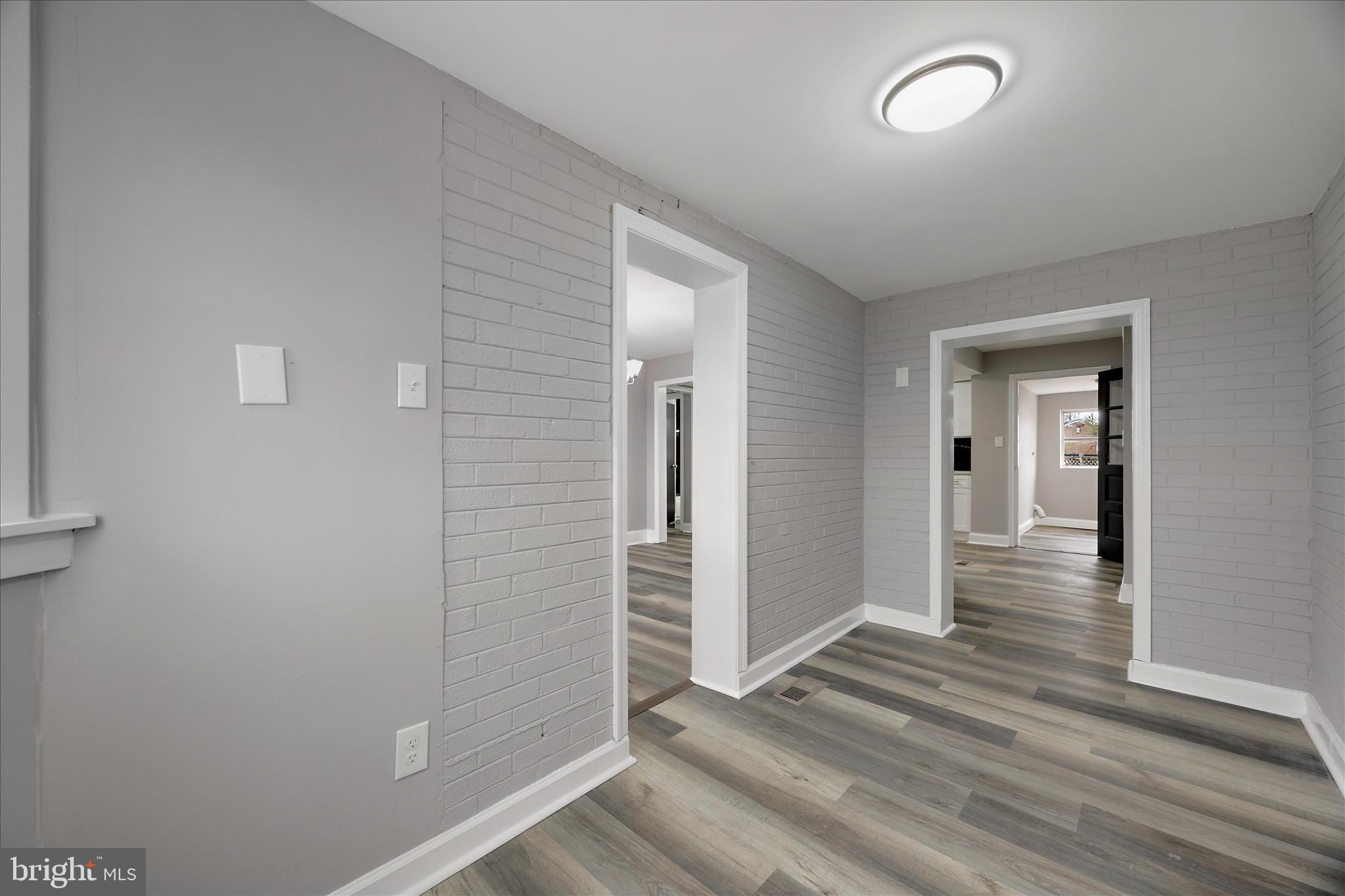 4007 Forestville Road District Heights, MD 20747 - Photo 8 of 45 a view of a hallway with wooden floor and closet