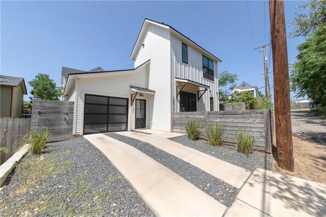 2002 East 9th Street, Unit 2 Austin, TX 78702 - Photo 28 of 32 A modern facade with striking vertical siding and a unique driveway offers superb curb appeal.
