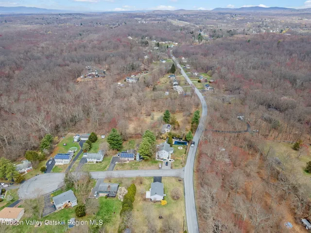 an aerial view of residential house and outdoor space