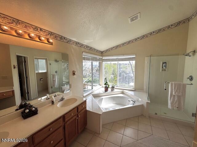2240 Springdale Court Reno, NV 89523 - Photo 10 of 24 a spacious bathroom with a tub sink and mirror
