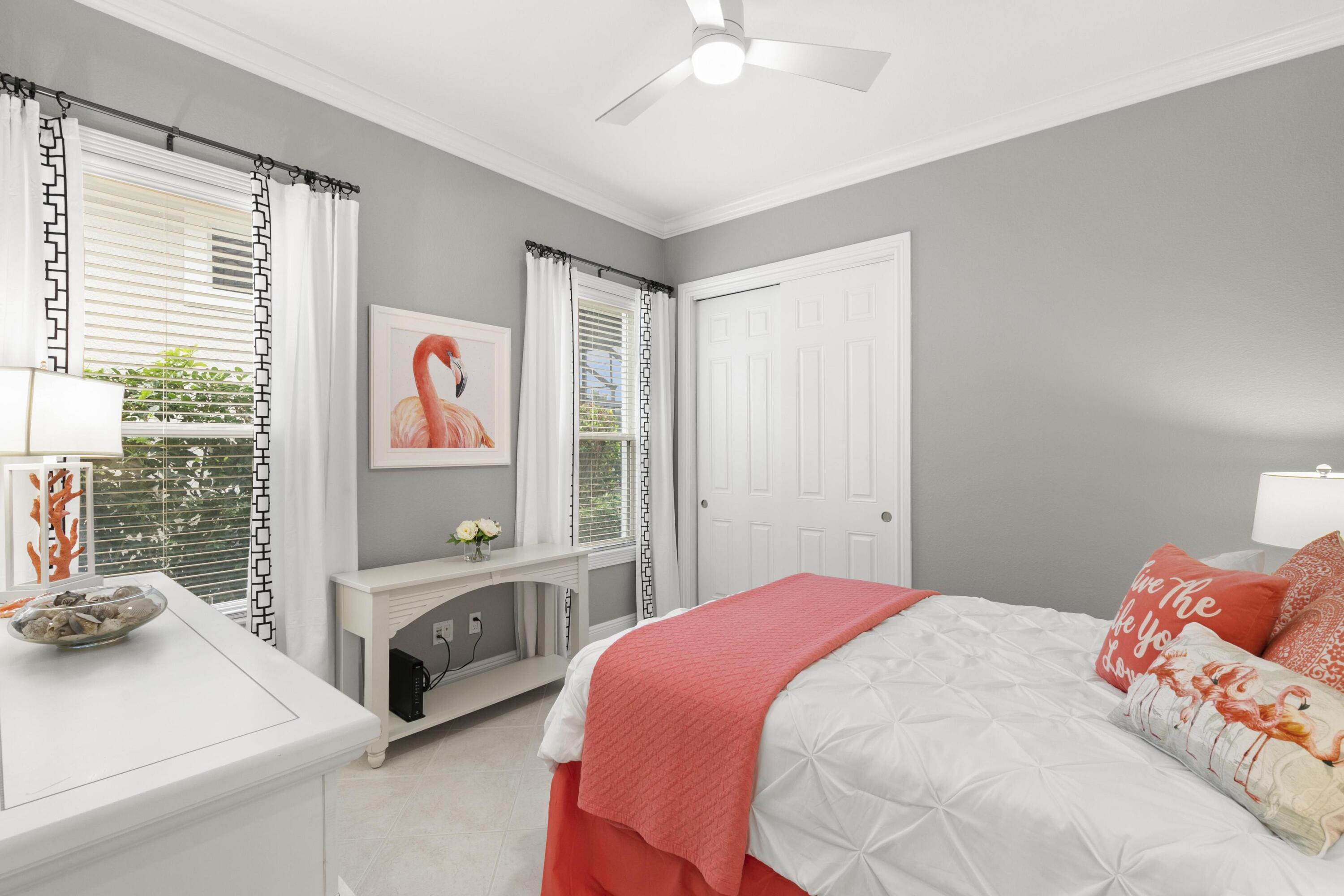 9100 Cherry Oaks Trail Naples, FL 34114 - Photo 18 of 33 a bedroom with a bed and a dresser