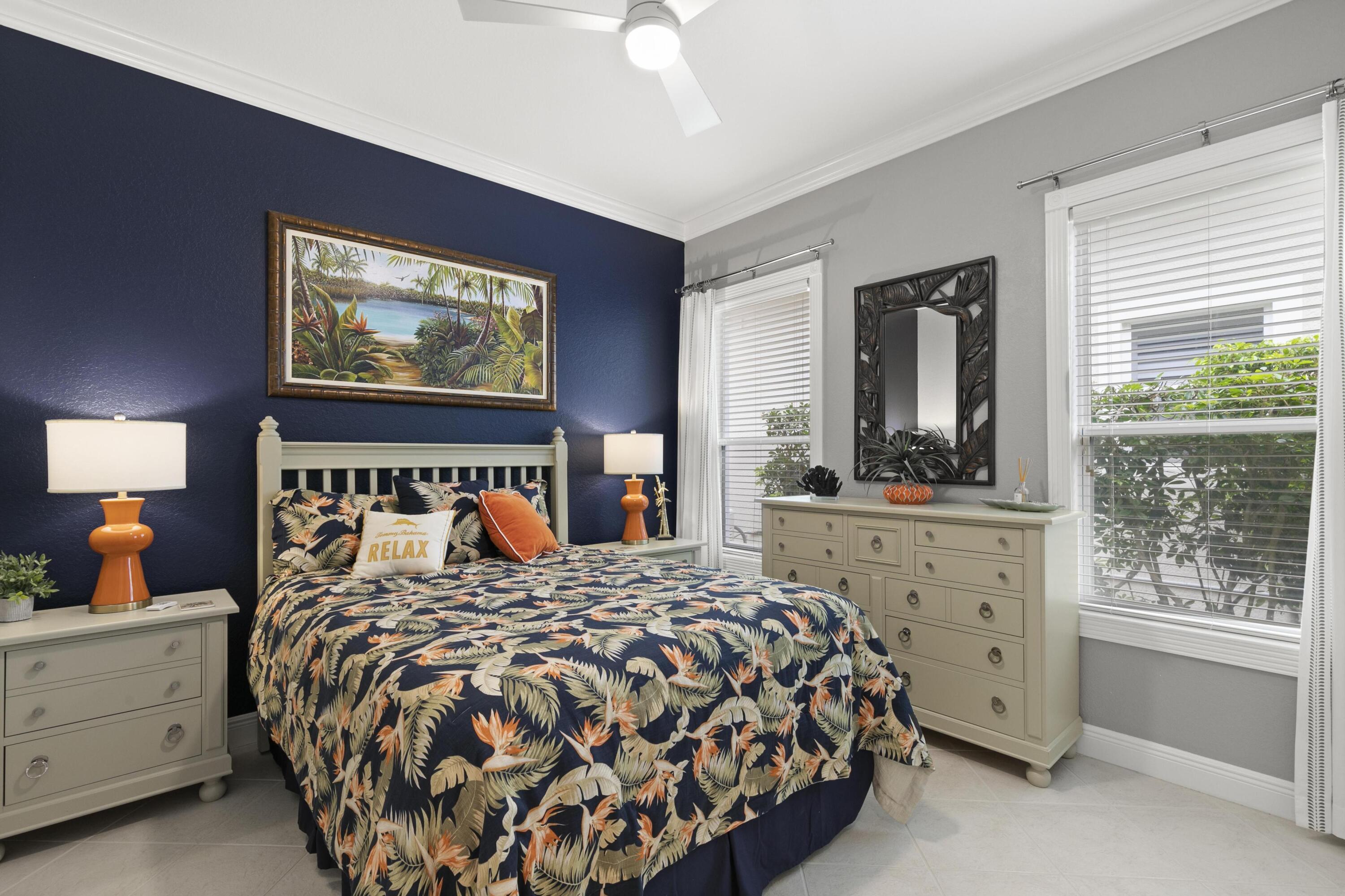 9100 Cherry Oaks Trail Naples, FL 34114 - Photo 20 of 33 a bedroom with a large bed and a window