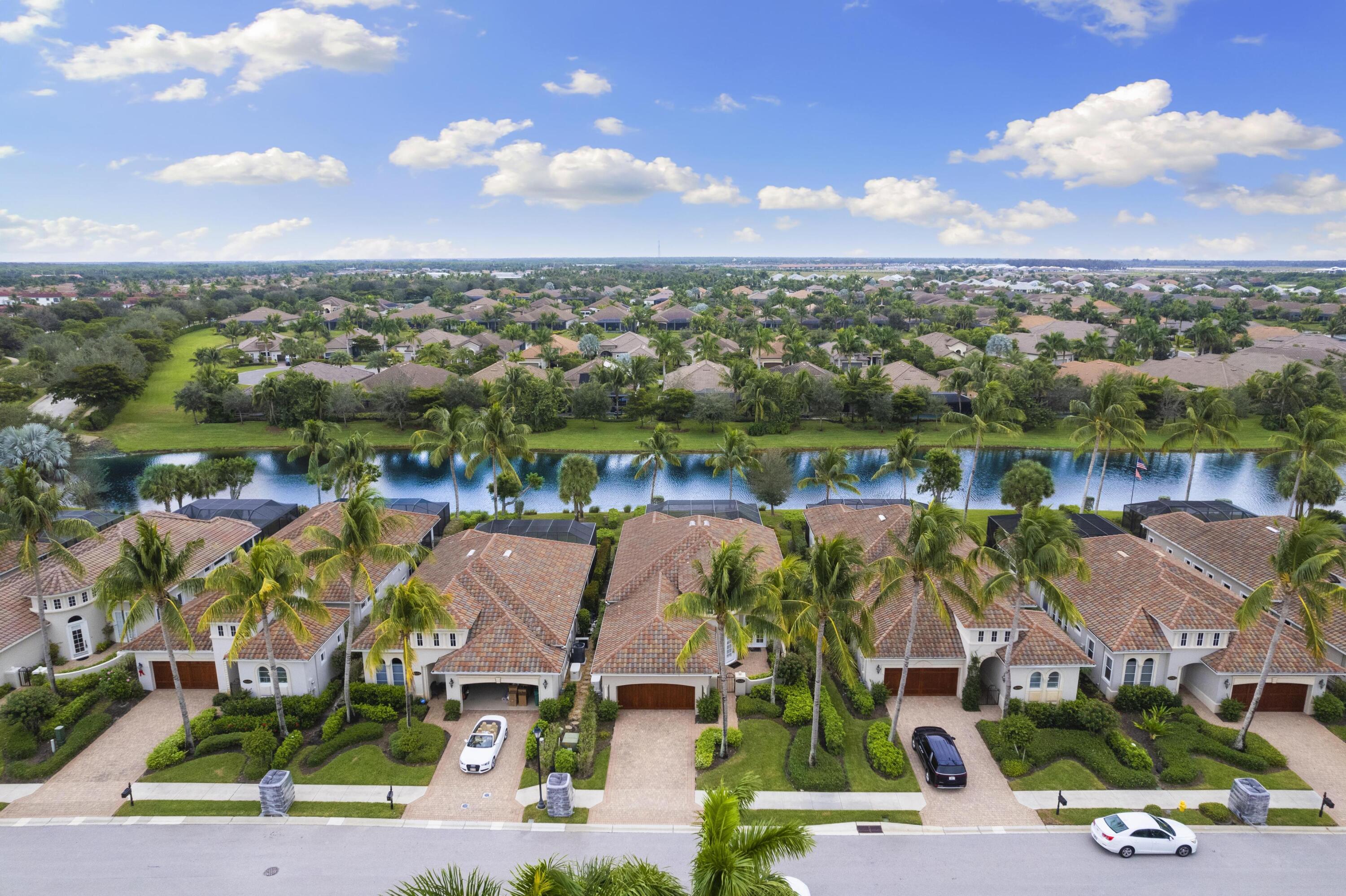 9100 Cherry Oaks Trail Naples, FL 34114 - Photo 5 of 33 an aerial view of residential houses with outdoor space and swimming pool