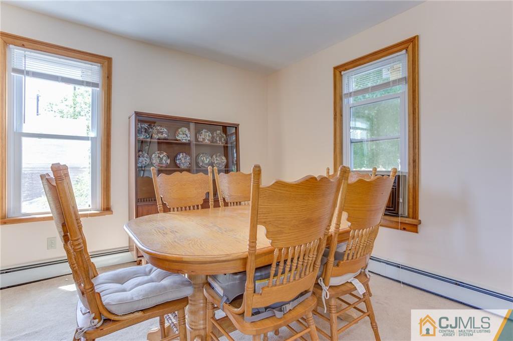 659 Ridge Road Monmouth Junction, NJ 08852 - Photo 11 of 24 a dining room with furniture and window