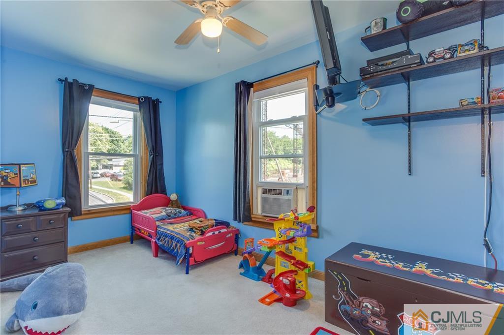 659 Ridge Road Monmouth Junction, NJ 08852 - Photo 15 of 24 a bedroom with a bed and a window