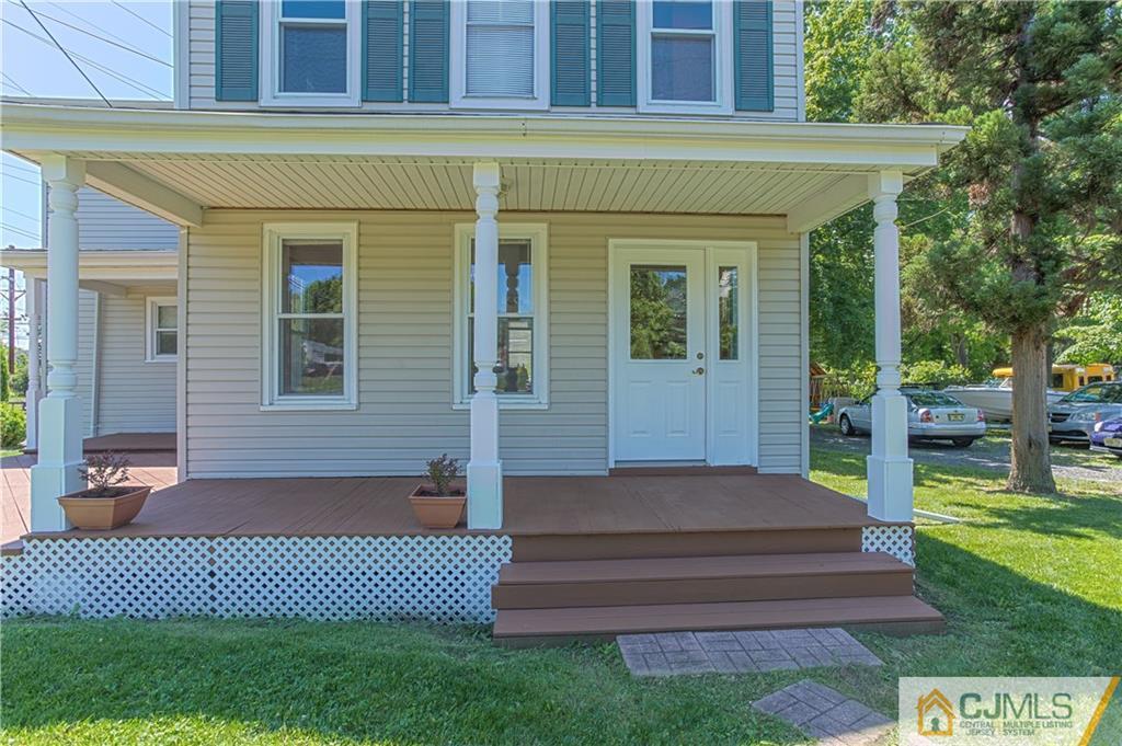 659 Ridge Road Monmouth Junction, NJ 08852 - Photo 4 of 24 a front view of a house with a garden