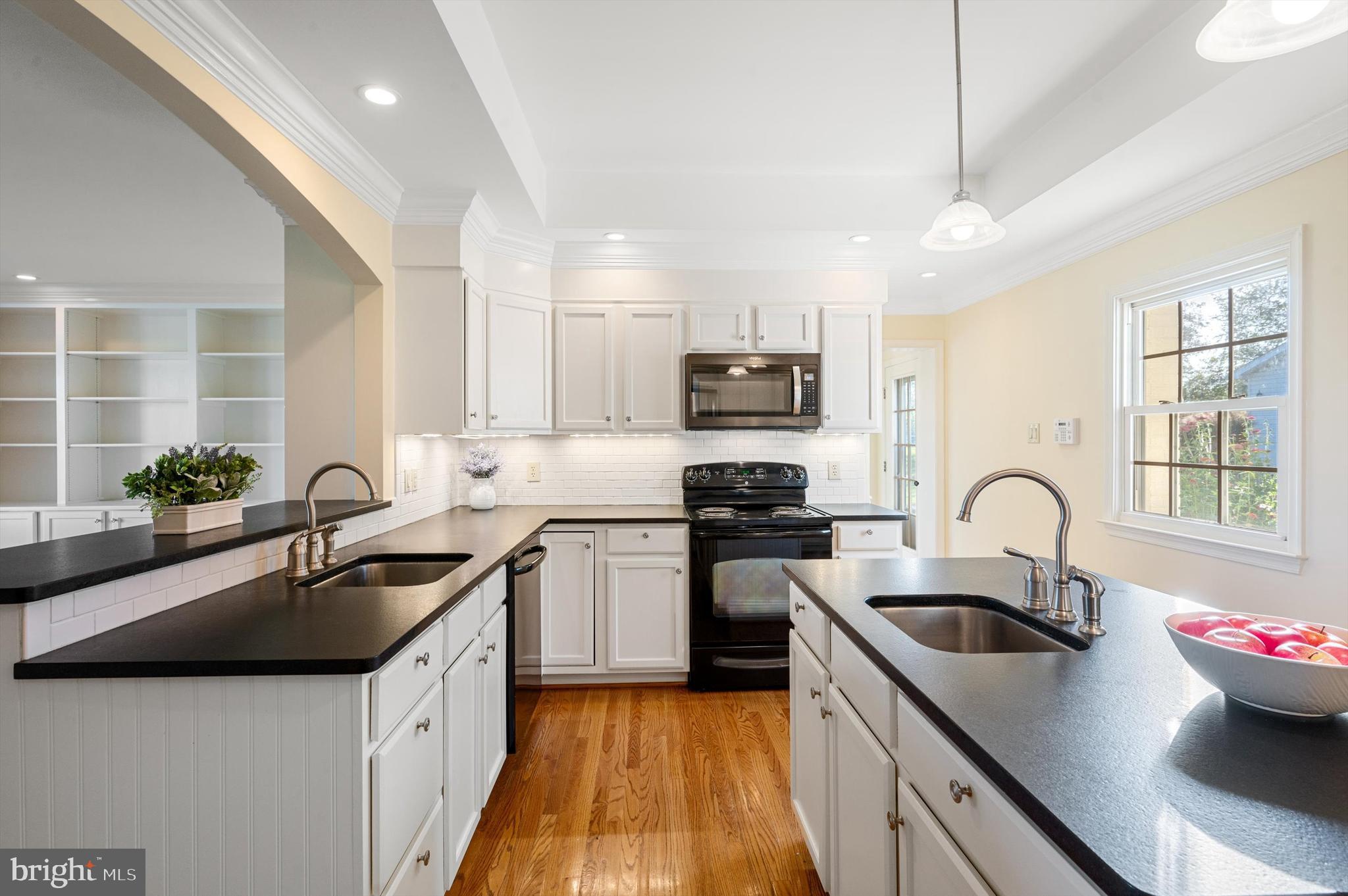 2801 Salem Church Road Berryville, VA 22611 - Photo 14 of 68 a kitchen with granite countertop a sink stainless steel appliances and cabinets