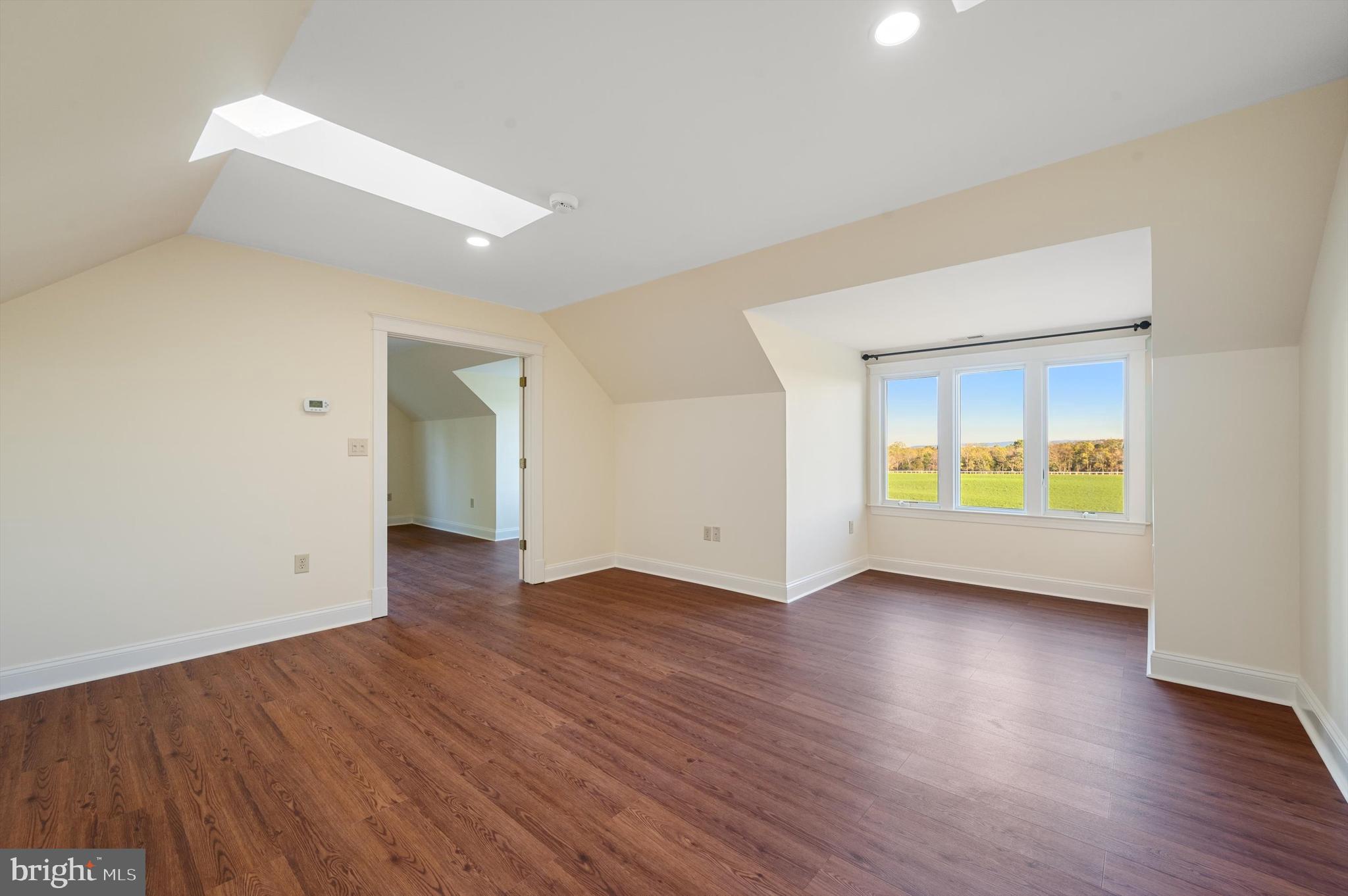 2801 Salem Church Road Berryville, VA 22611 - Photo 40 of 68 an empty room with wooden floor and windows