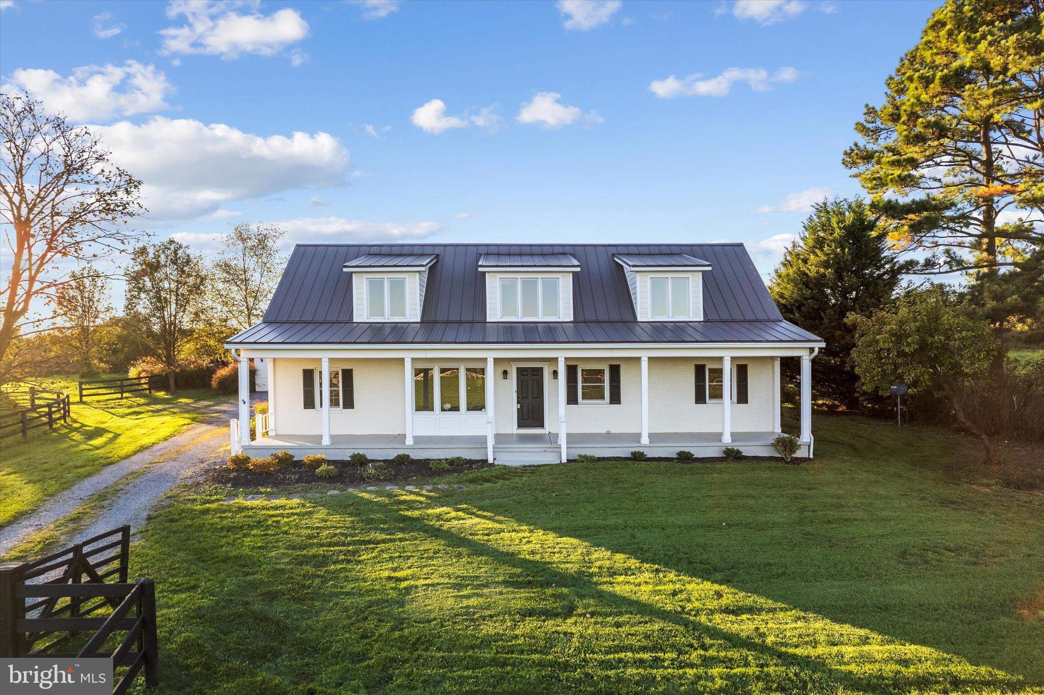 2801 Salem Church Road Berryville, VA 22611 - Photo 5 of 68 a house view with swimming pool and trees in the background