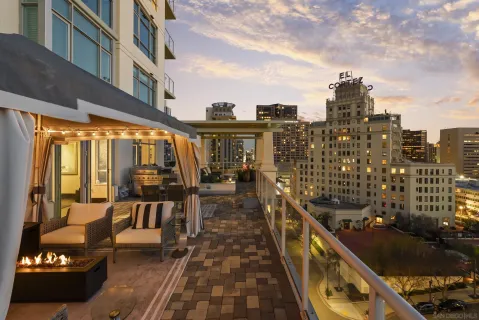 a view of a terrace with furniture