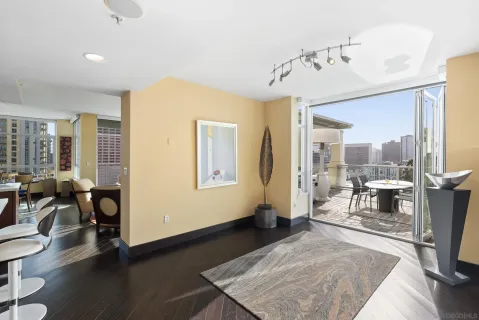 a kitchen with a sink cabinets and wooden floor