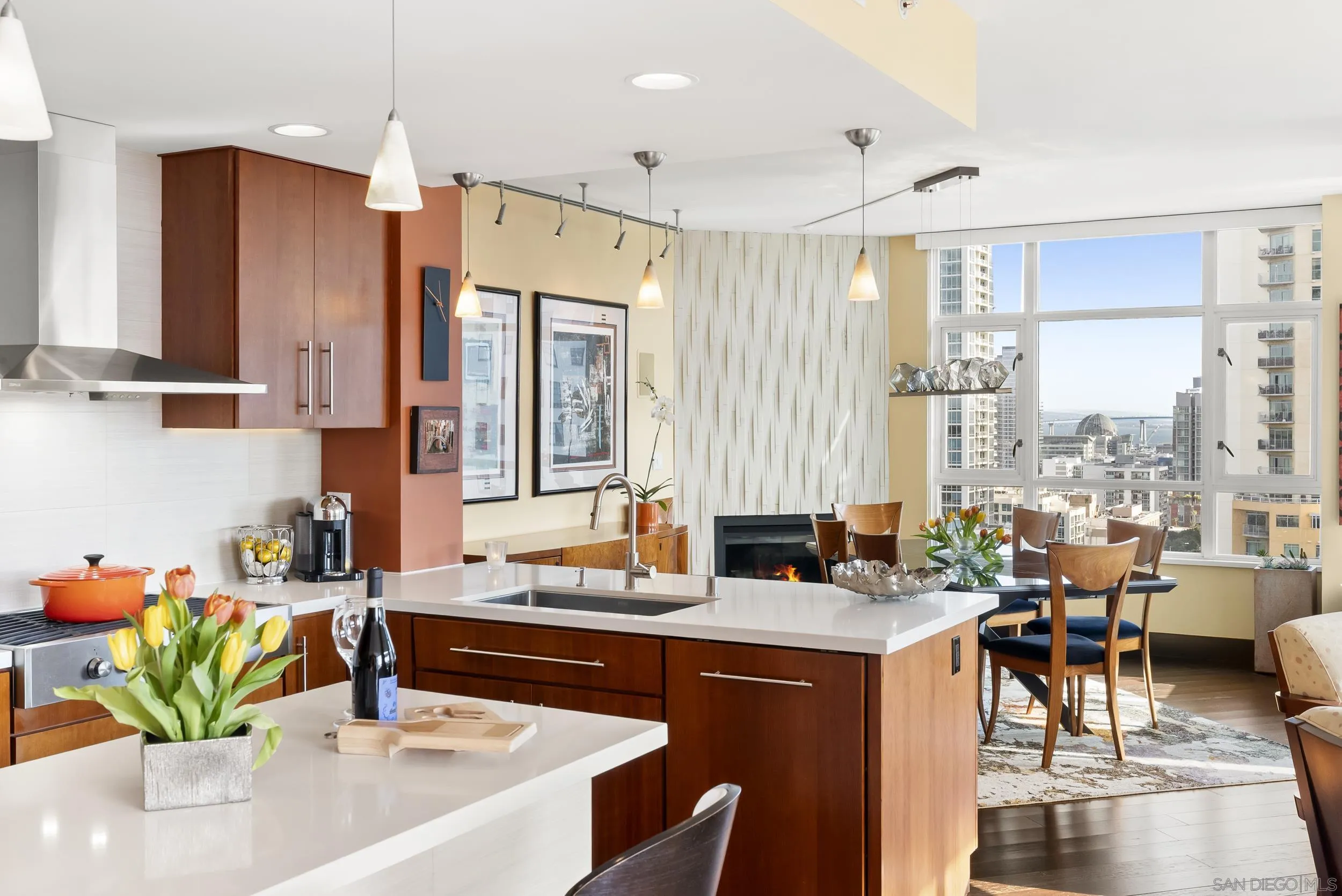 850 Beech Street, Unit 1205 San Diego, CA 92101 - Photo 13 of 66 a very nice looking kitchen with a large window a sink and living room view