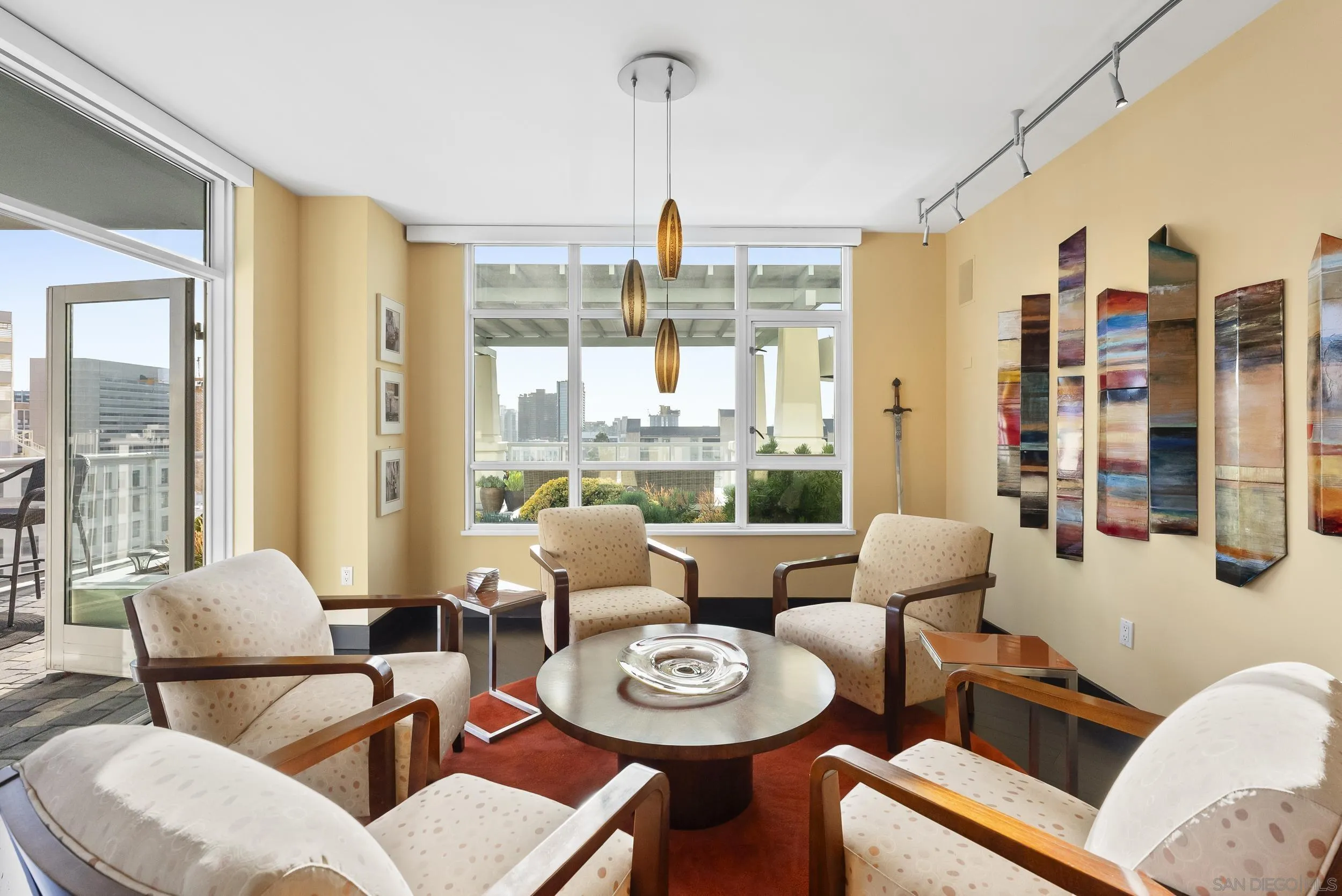 850 Beech Street, Unit 1205 San Diego, CA 92101 - Photo 21 of 66 a living room with furniture and a large window