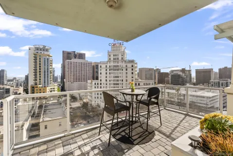 a view of a balcony with city view