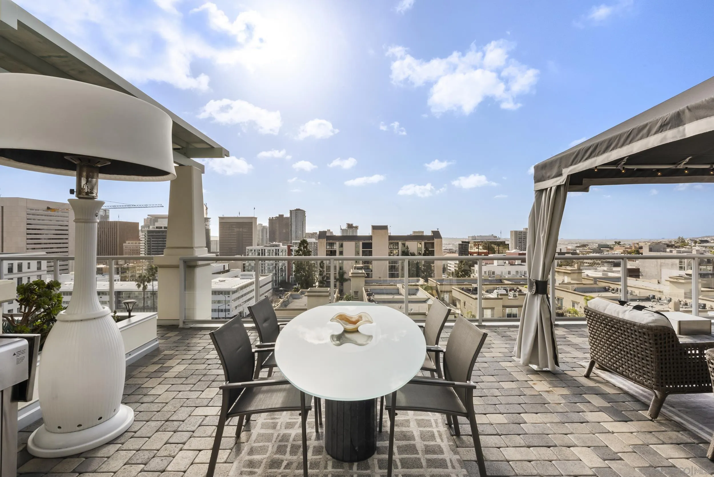 850 Beech Street, Unit 1205 San Diego, CA 92101 - Photo 29 of 66 a view of a terrace with furniture and stove