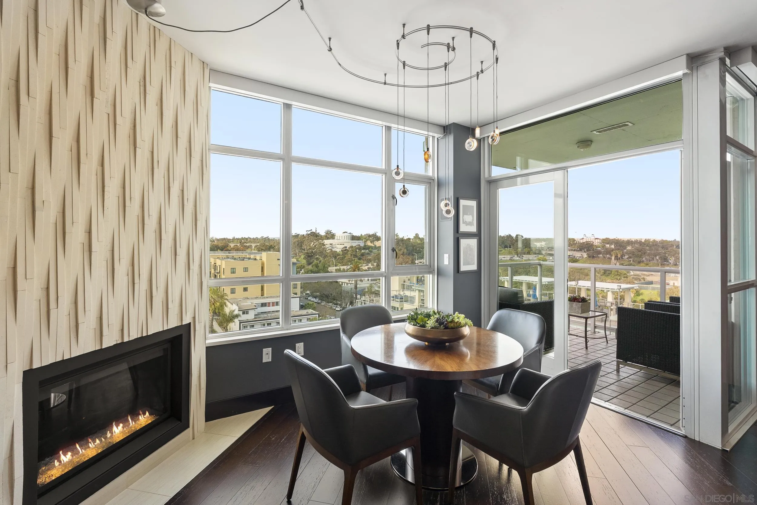 850 Beech Street, Unit 1205 San Diego, CA 92101 - Photo 38 of 66 a view of a dining room with furniture window and wooden floor
