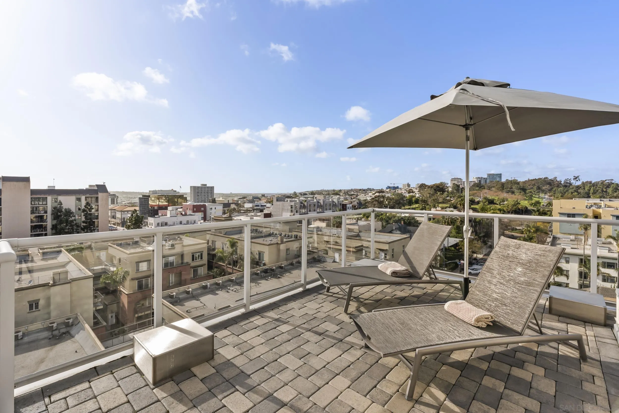 850 Beech Street, Unit 1205 San Diego, CA 92101 - Photo 44 of 66 a view of a terrace with furniture and stove