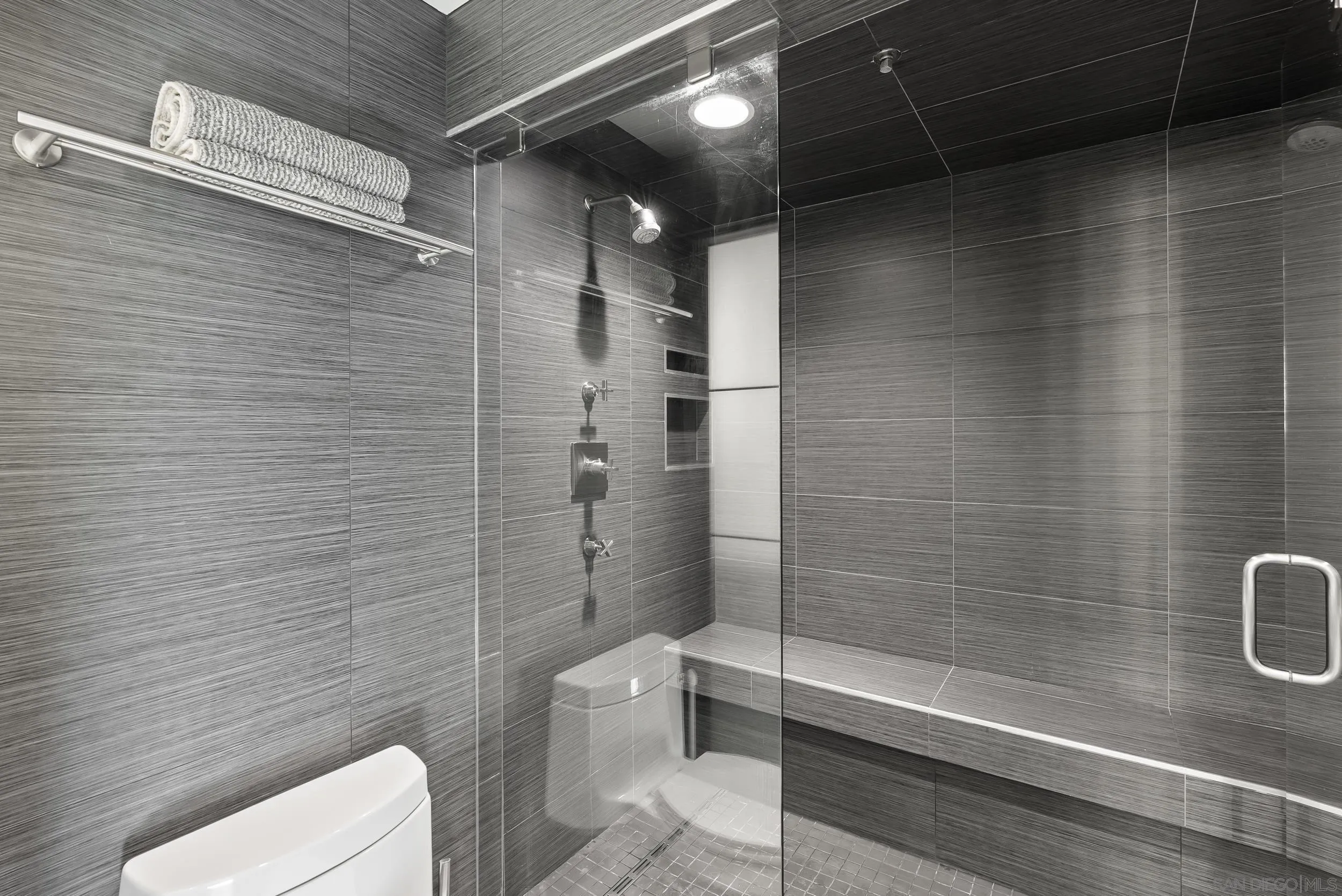 850 Beech Street, Unit 1205 San Diego, CA 92101 - Photo 47 of 66 a bathroom with a toilet and a shower