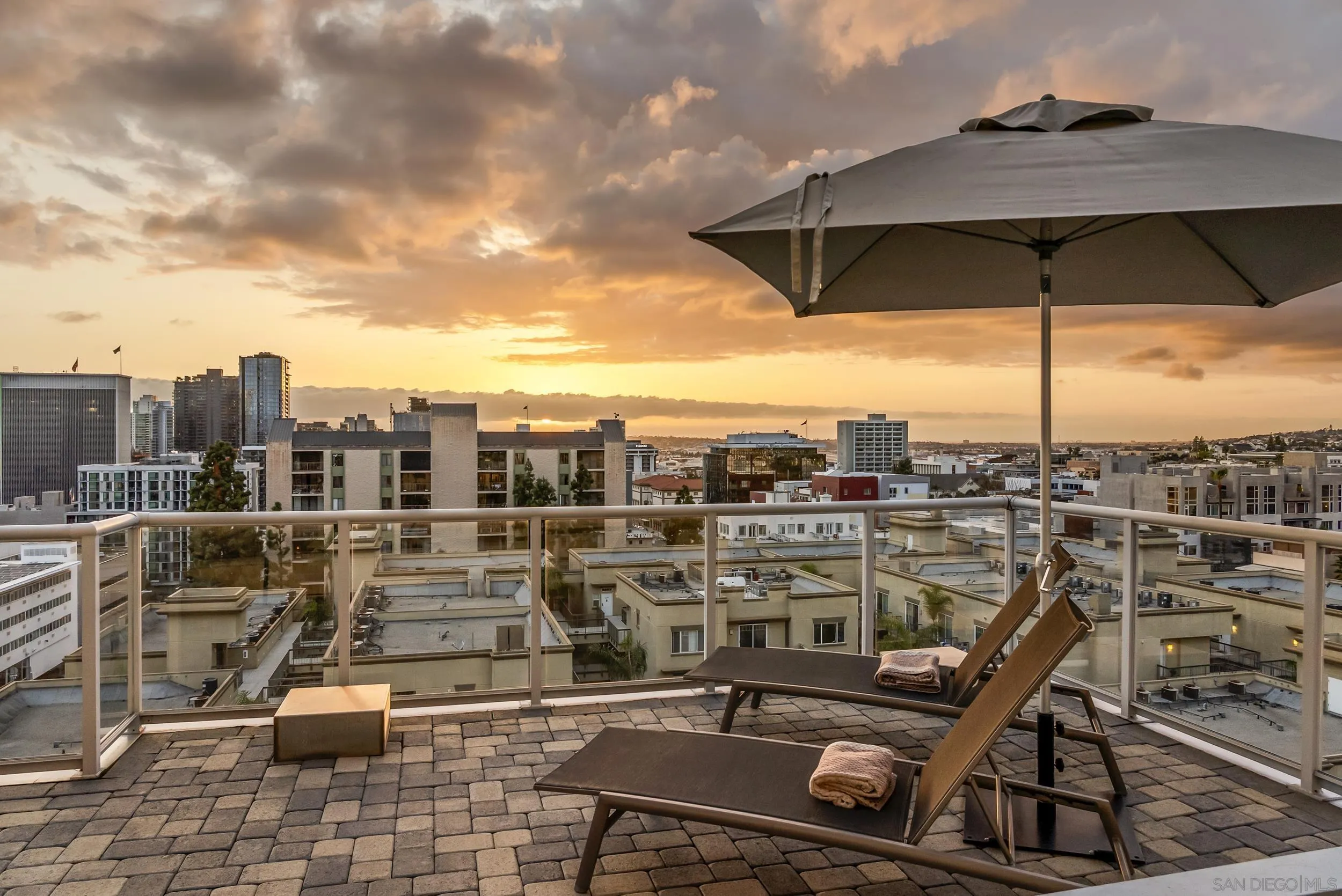 850 Beech Street, Unit 1205 San Diego, CA 92101 - Photo 6 of 66 a terrace with outdoor seating and city view