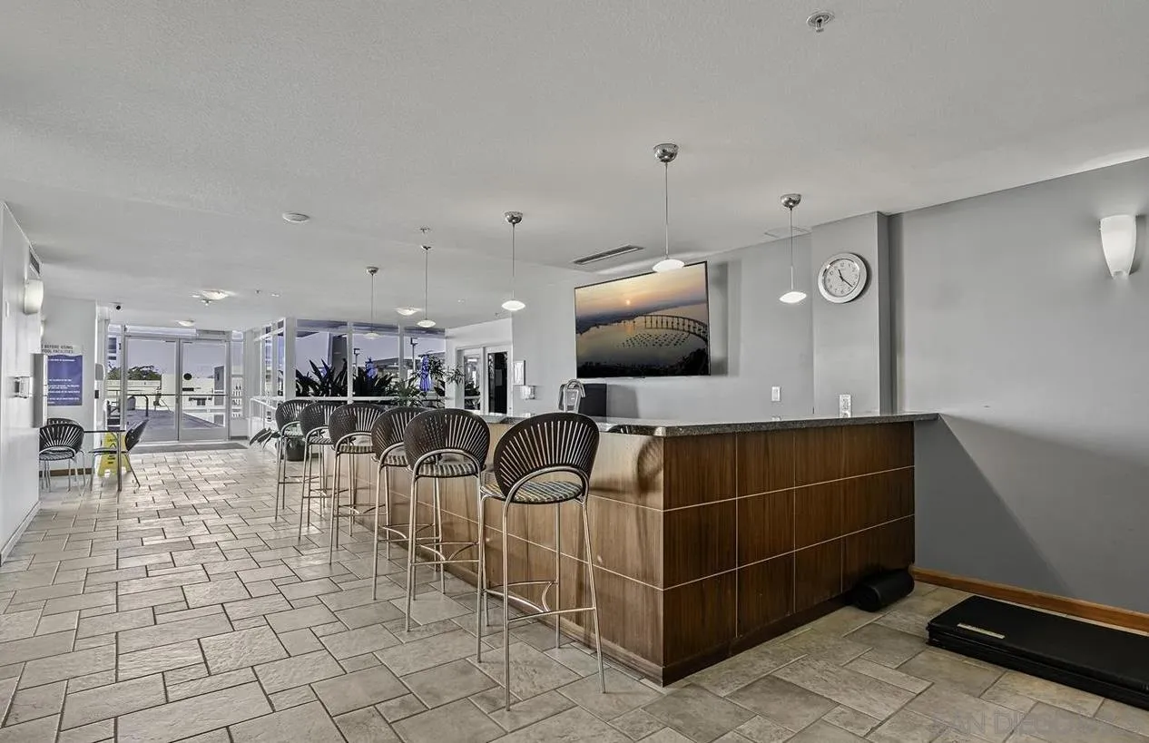850 Beech Street, Unit 1205 San Diego, CA 92101 - Photo 61 of 66 a room with lots of furniture and a flat screen tv