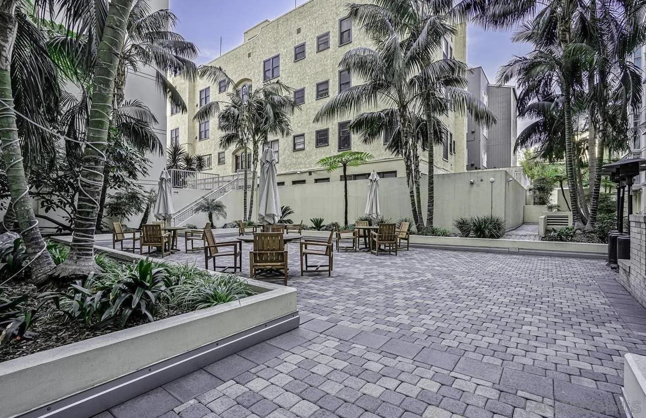 850 Beech Street, Unit 1205 San Diego, CA 92101 - Photo 62 of 66 a row of palm trees in front of a house